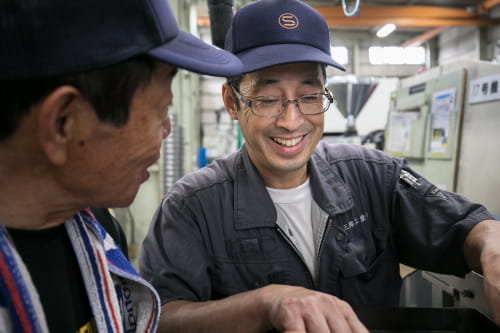三輝工業社員の笑顔写真